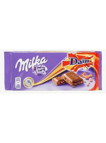 Молочный шоколад Milka Daim 100г с кусочками хрустящей карамели 